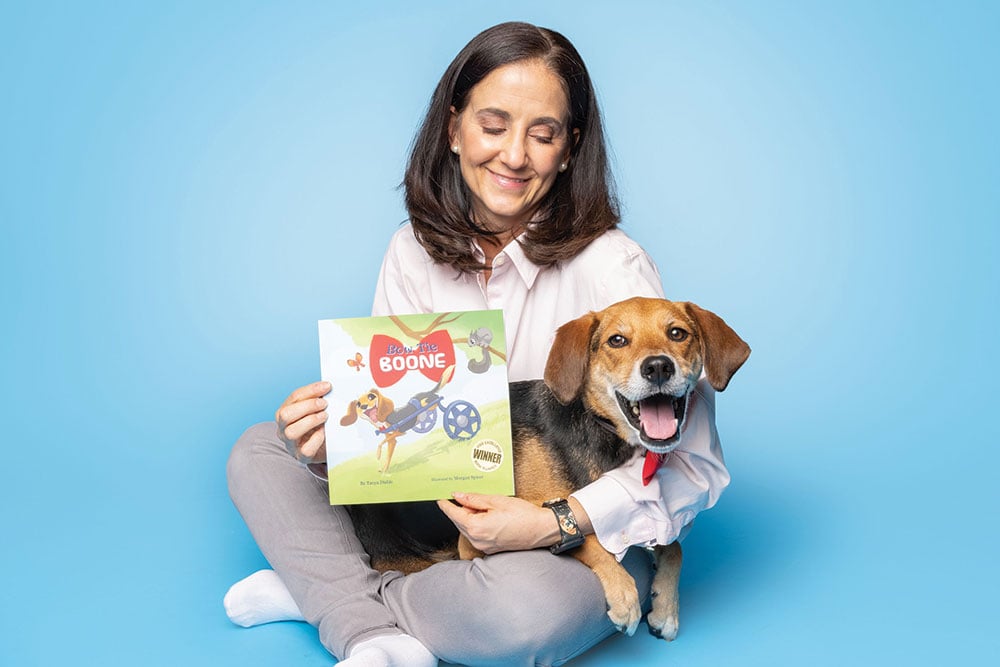 Tanya Diable With Boone And Book She Wrote Photo By Greg Murray Photography